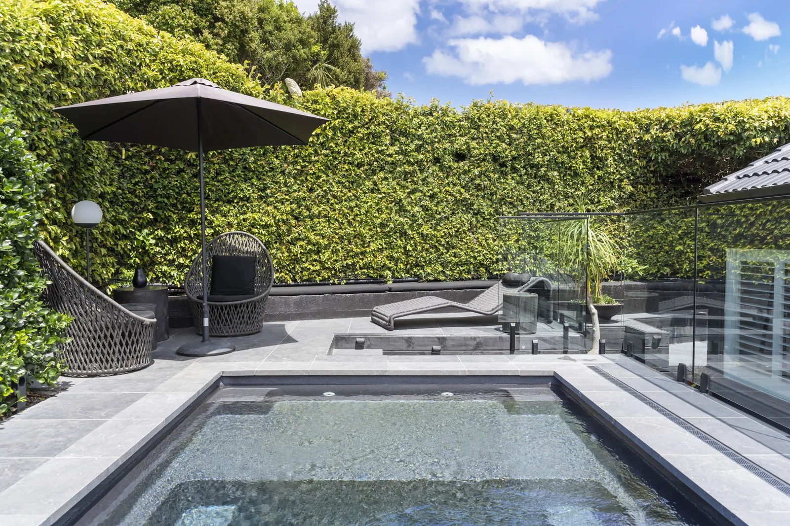 Swimming pool tiling project in Pt Chevalier, Auckland — interior design by Kirsty Vegas, tiling by Tarara Tiling